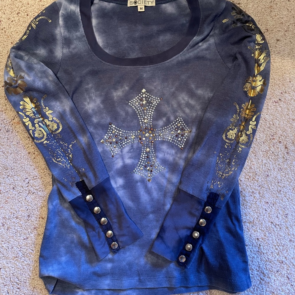 Rhinestone cross. Gold pattern on arms, with silver buttons on sleeve, tie dye